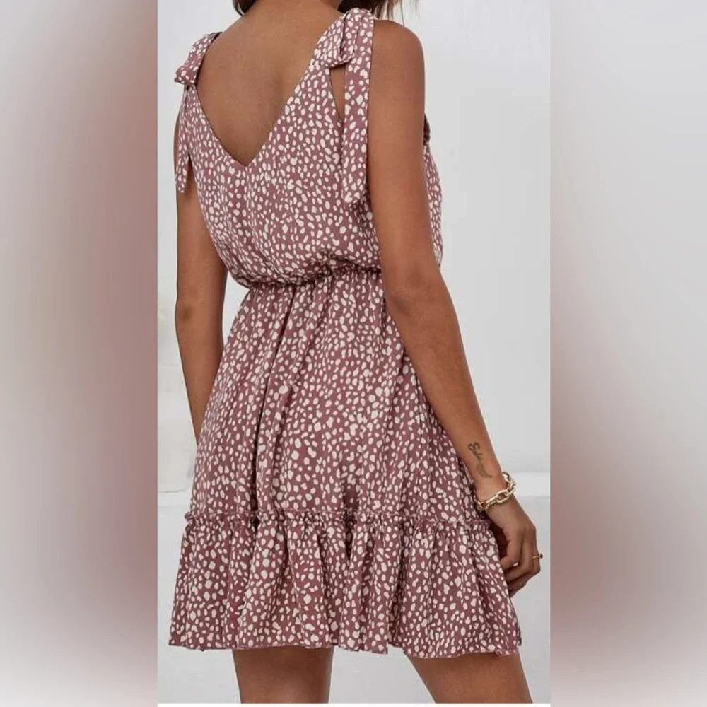 SHEIN size MEDIUM mauve and white animal print ruffled dress with ties.